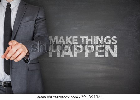 Make things happen on blackboard with businessman