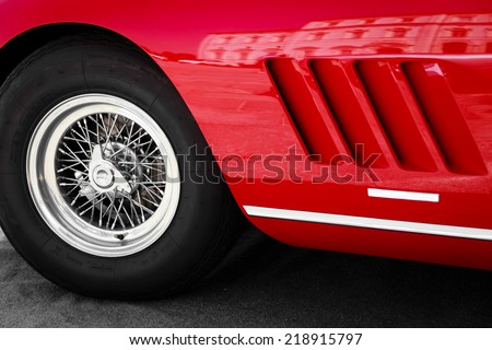 close up front left of a vintage red sports car