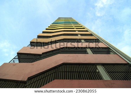 CHOI HUNG ESTATE, HONG KONG - SEP 13: Up view of ladder of Choi Hung Estate on Sep 13, 2014 in Choi Hung, Hong Kong. It is painted with rainbow colors to match the name of \