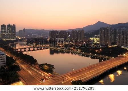SHING MUN RIVER, HONG KONG - OCT 11: Sunset view of Shing Mun River at Shatin, Hong Kong on Oct 11, 2014. The river is famous for recreational users such as rowers, anglers and cyclists.