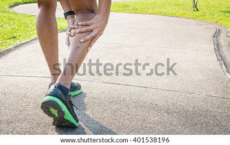 Male runner with muscle pain in right leg, Leg calf sport muscle injury
