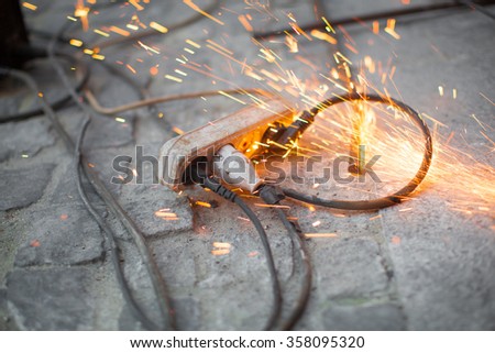 burning electrical outlet shorting, danger
