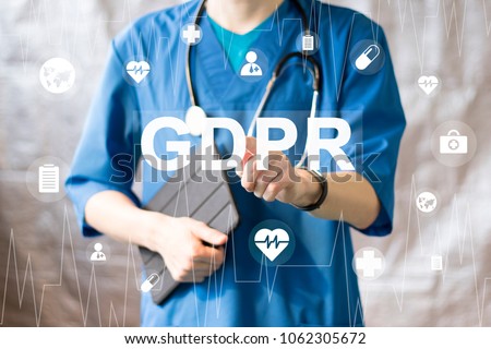 Doctor pressing button GDPR Data Protection Regulation healthcare on virtual panel medicine.