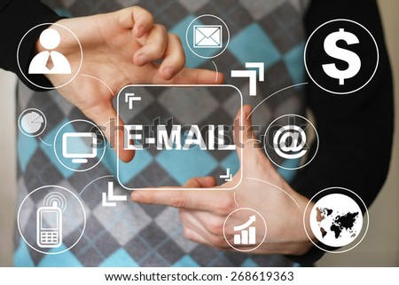 Businessman pressing messaging mail icon sending virtual