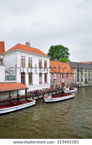 BRUGES, BELGIUM - JUNE 7,2011: Houses along the canals of Brugge or Bruges. Bruges is frequently referred to as \