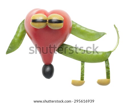 Funny dog made of tomato and peas