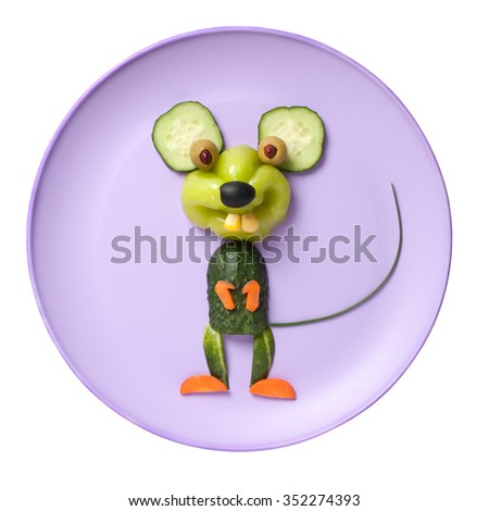 Happy vegetable mouse on pink plate and white background