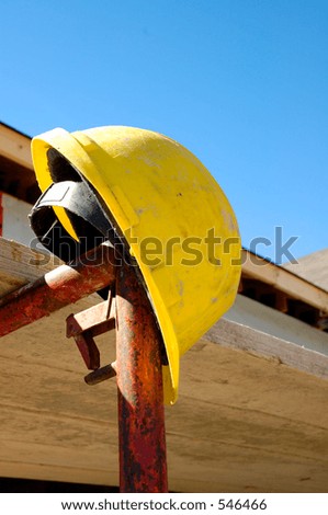Construction Hard Hat Hanging On Scaffolding