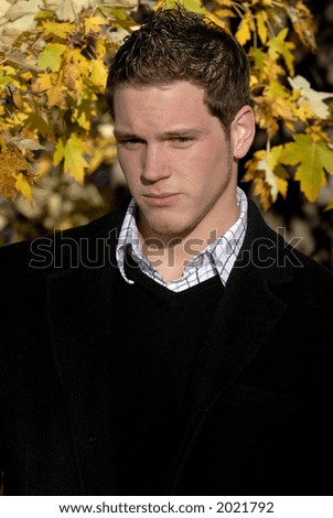 Handsome Young Man Outside On A Fall Day