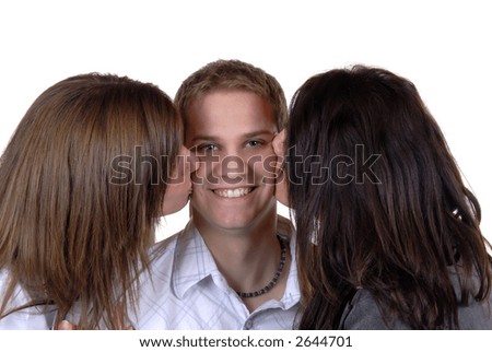 stock photo Two Girls Kissing A Lucky Young Man