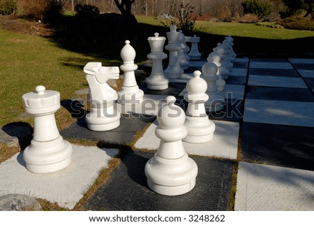 Giant Garden Chess Set Set Out For A Game Of Chess