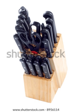 Butchers Block Holding A Complete Set Of Chef's Knives