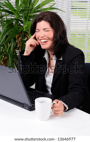 Business Woman Enjoying A Funny Moment At Work