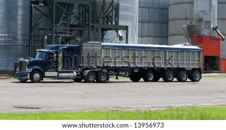 Grain Truck Eighteen Wheeler At The Distribution Silos