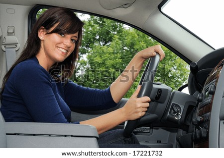 Young Woman Driving Her Sports Utility Truck