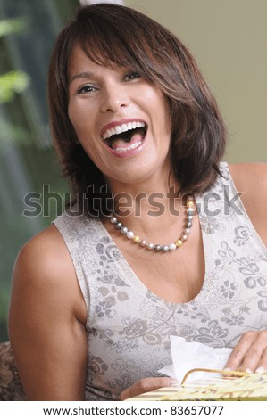 Mature Woman Caught Laughing At A Party