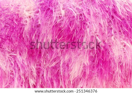 pink dyed sheepskin rug as a background