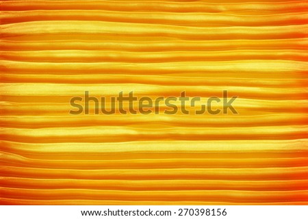 Dark gold creased fabric silk for background