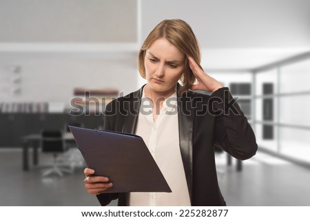 nervous girl/nervous girl with a folder in hands