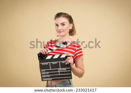 worker film industry/ young girl with a clapperboard cinema
