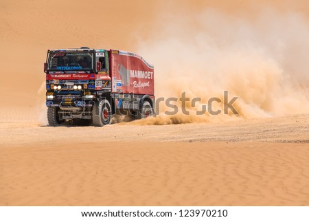 ICA, PERU - JAN. 06: MARTIN VAN DEN BRINK (NLD) and his team,drive his truck during his participation on Rally Dakar 2013, JAN 06, 2013 in Ica, Peru.