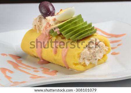 Peruvian Food: Causa Rellena, A smashed popatoes filled with crab meal.