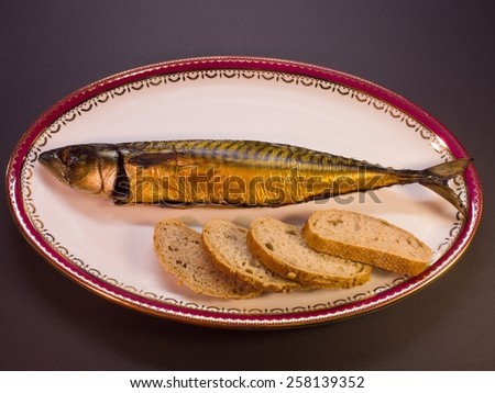 Smoked mackerel simple dish on rustic white plate