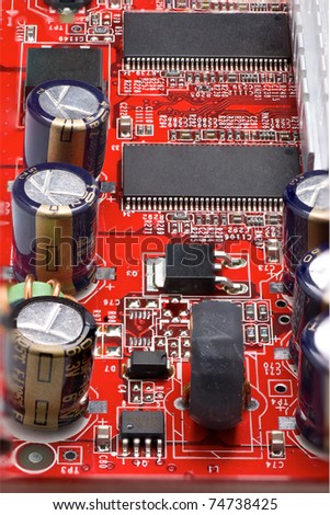 Piece of dusty red circuit board