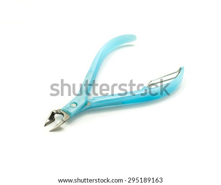 Tools of a manicure set isolated on white background, hair clip, nail clippers, nail file with clipping path