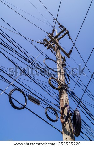 Messy Electric wire  on  the pole in Thailand.