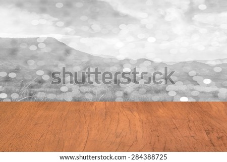Wooden empty vintage table with bokeh natural black and white background