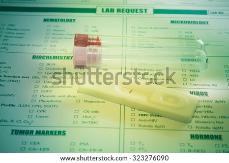 Lab request concept for HIV or Hepatitils virus cassette test,vintage tone