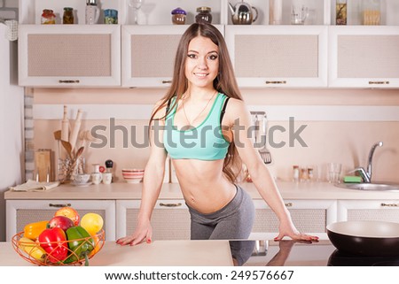 fitness girl cooking healthy food