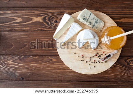 cheese plate with Brie, Camembert, Roquefort