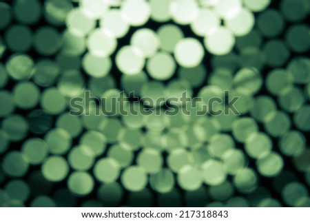 Abstract background with bokeh de focused lights and shadow aqua green and white color.