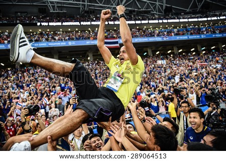 Kallang,Singapore - JUNE 15:Head coach Choketawee Promrut celebrates winning the gold medal. 28th SEA Games Singapore 2015 at Singapore National Stadium on JUNE15 2015