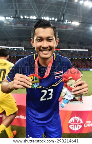 Kallang,Singapore - JUNE 15:Chananan Pombubpha celebrates winning the gold medal. 28th SEA Games Singapore 2015 at Singapore National Stadium on JUNE15 2015