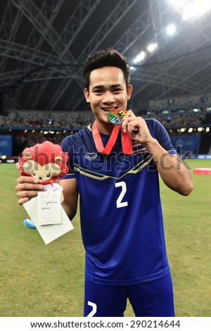 Kallang,Singapore - JUNE 15:Peerapat Notchaiya celebrates winning the gold medal. 28th SEA Games Singapore 2015 at Singapore National Stadium on JUNE15 2015