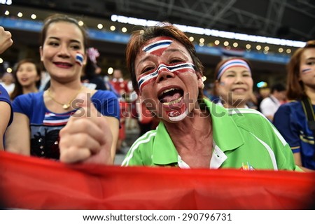 Kallang,Singapore - JUNE 15:Unidentified fan of Thailand national supporters during the 28th SEA Games Singapore 2015 match between Thailand and Myanmar at Singapore National Stadium on JUNE15 2015