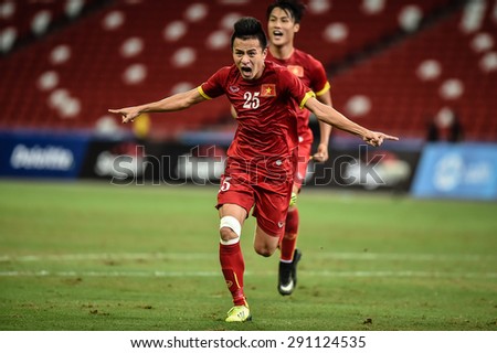Kallang,Singapore - JUNE 15:VO Huy Toan of Vietnam celebrates after scoring during the 28th SEA Games Singapore 2015 match between Vietnam and Indonesia at Singapore National Stadium on JUNE15 2015