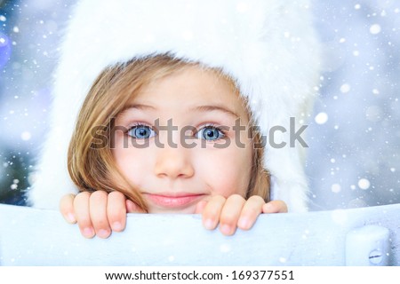 Beautiful little girl with white hat