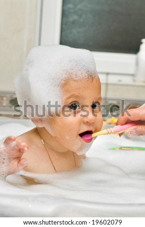 First steps in brushing your teeth are not easy.