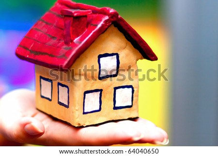 The house in woman hands