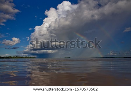 Rainbow over Amazon River near Cuxiu Muni, Amazon River, Brazil