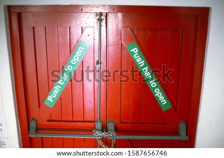 Detail view of double doors displaying \
