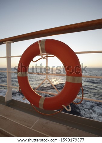 Life preserver on ship railing