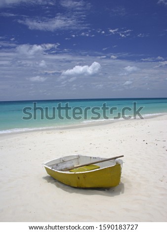 Little Boat at the white Beach of Ouvea Island, Loyalty Islands, New Caledonia, Overseas Territory of France