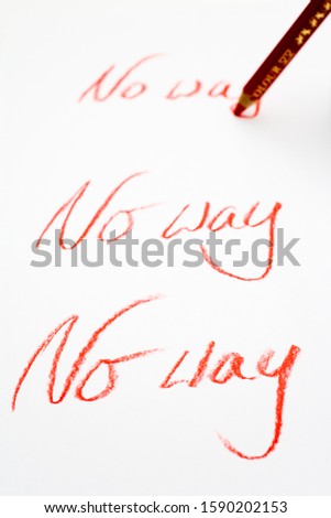 Red pencil writing No Way multiple times