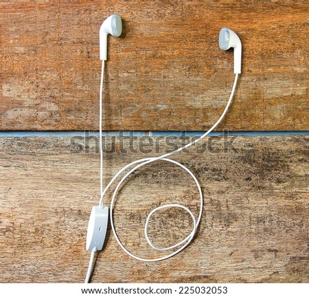 Headphones on old wood
