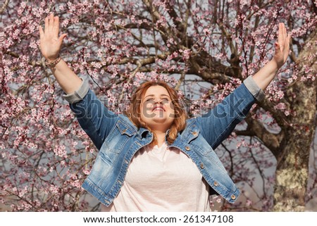 Grateful woman celebrating spring
